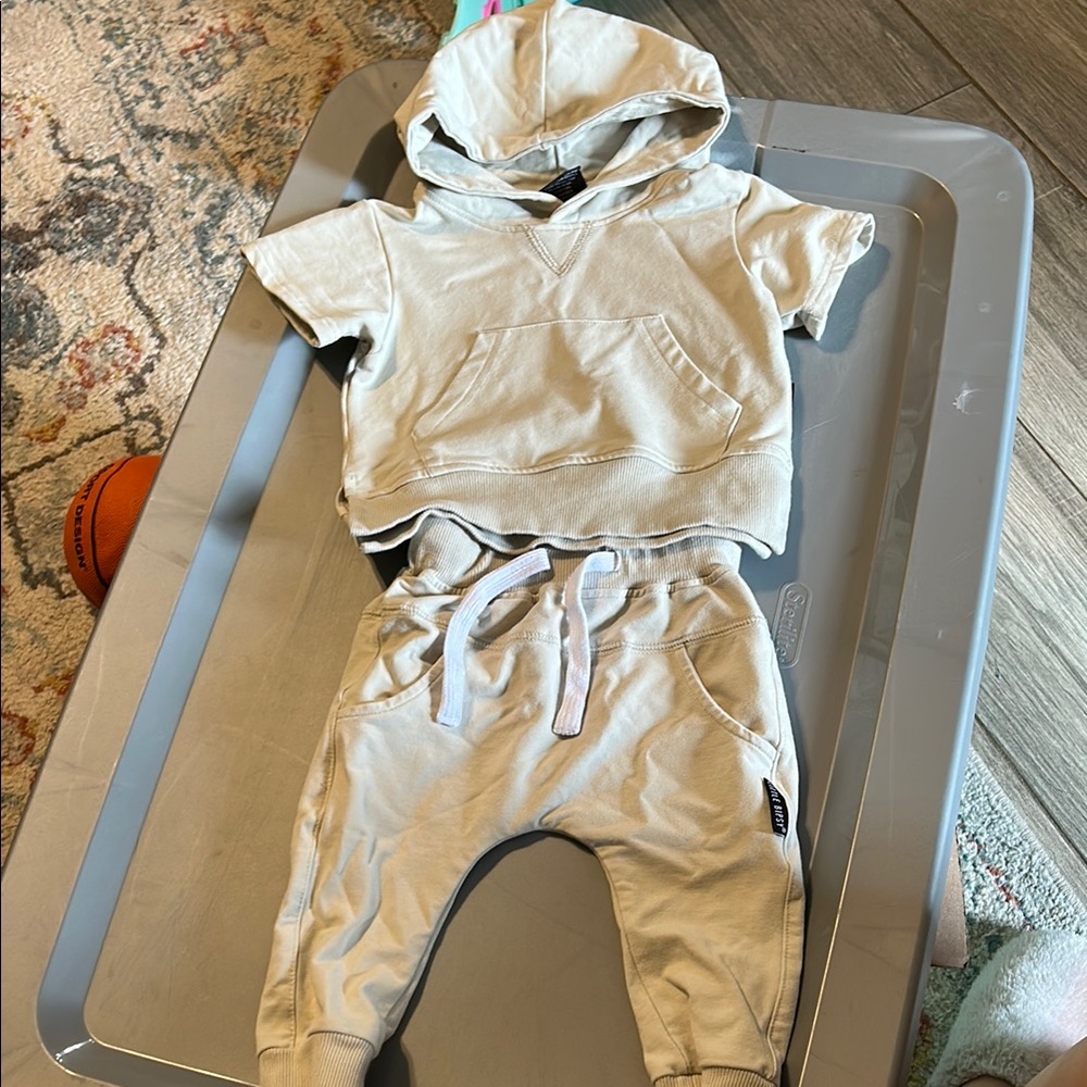 Little Bipsy Cream jogger style pants and short sleeve hooded shirt. Relaxed Fit